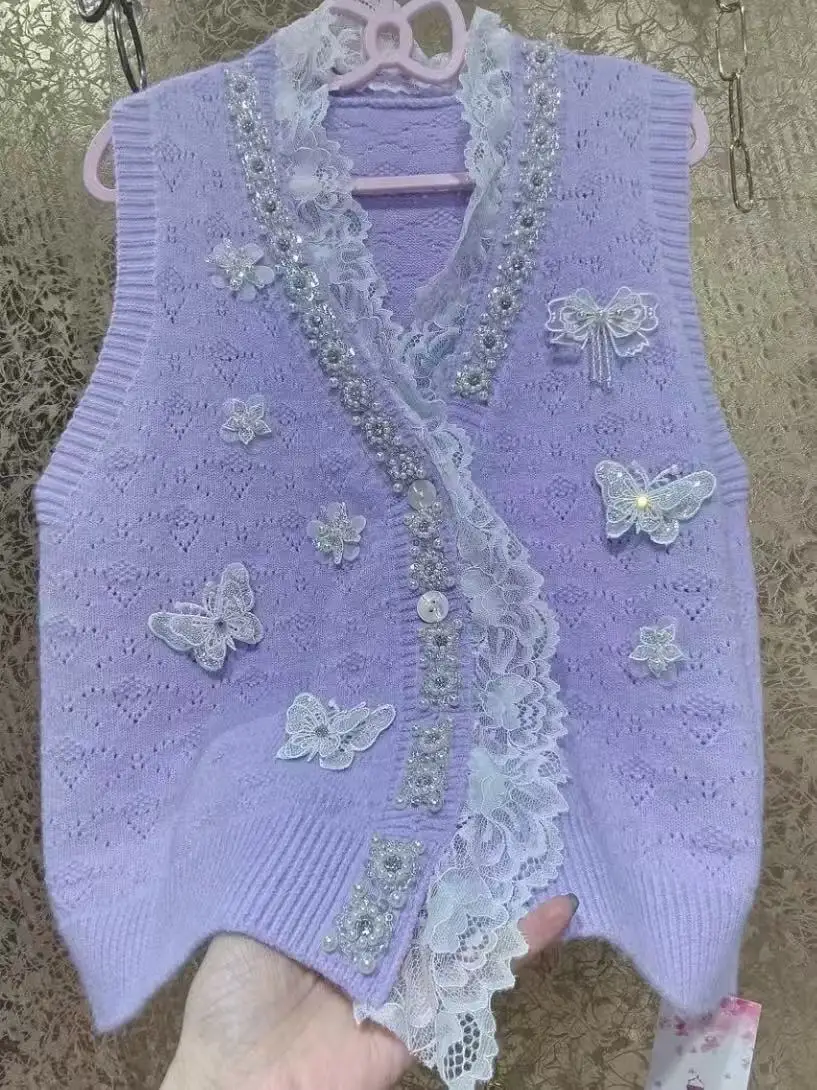 فاخر فريد تصميم المرأة تريكو سترة سترة صوف من دون أكمام اتجاهات 2025 الخريف محبوك ملابس امرأة