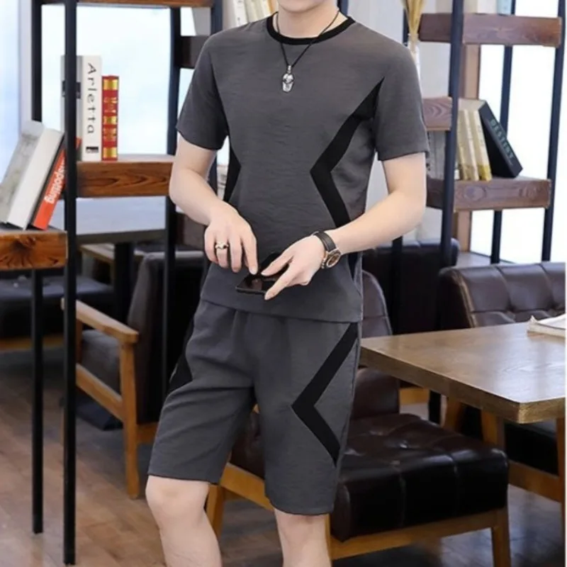 2026 New Men's Summer Sports Casual Two Piece Set Korean Loose Short Sleeve T Shirt Five Inch Shorts