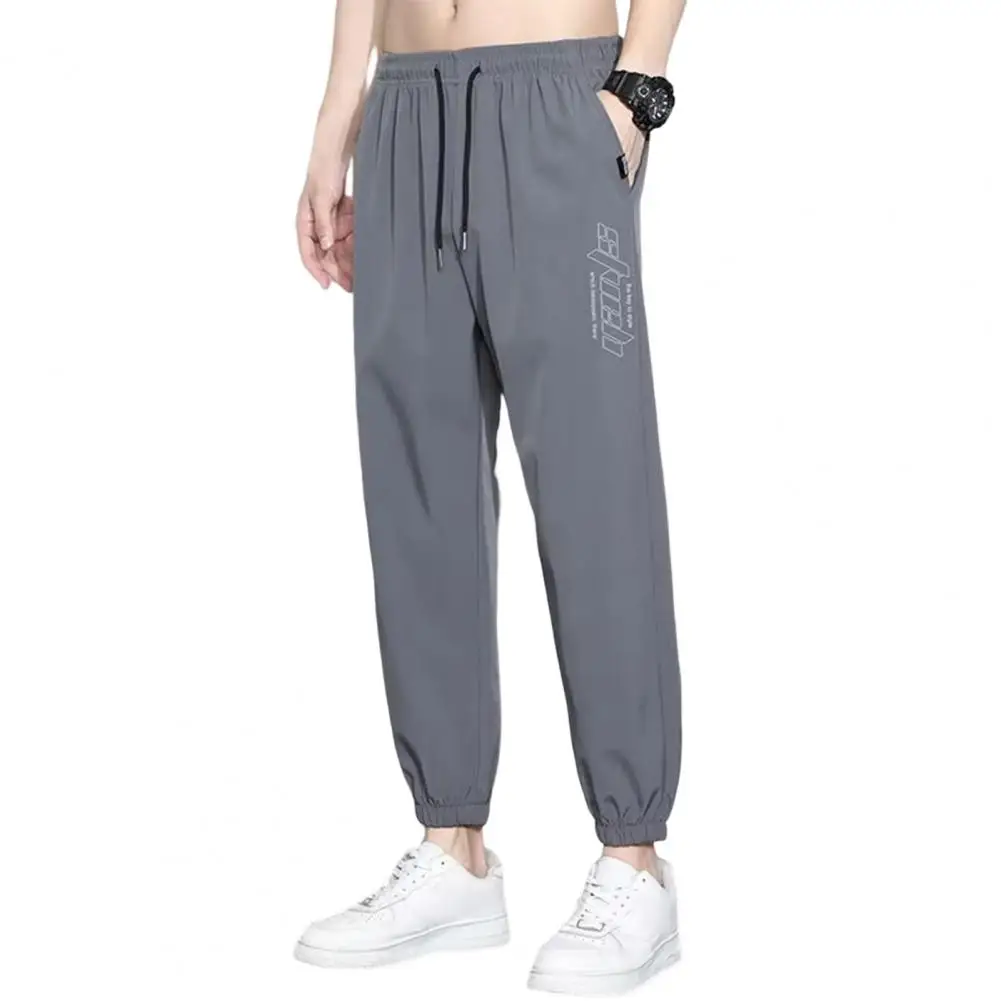 

Jogging Sweatpants Tracksuit Mid-rise Elastic Waistband Drawstring Pockets Sport Pants Men Ice Silk Thin