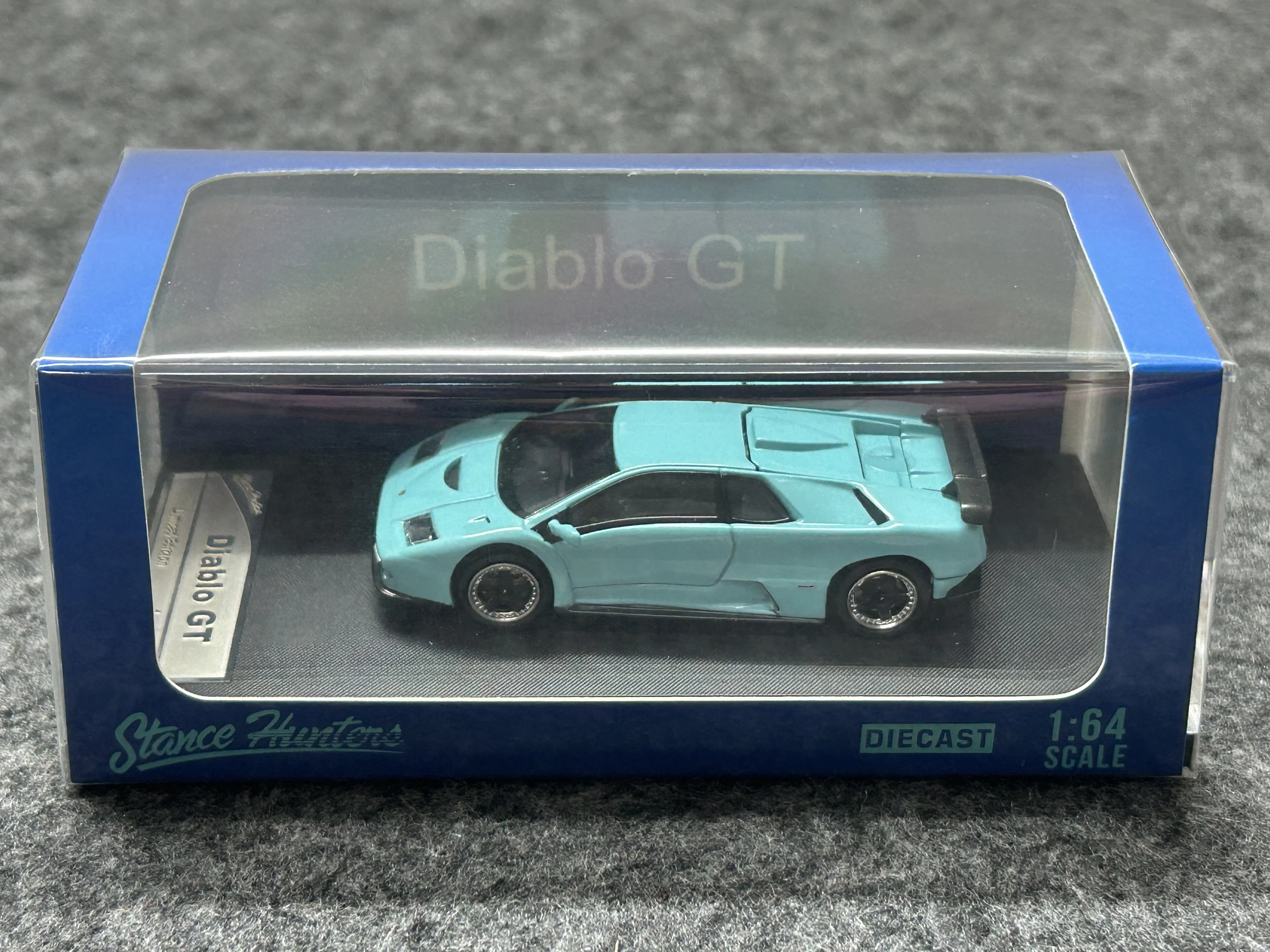 

Stance Hunters SH 1:64 Lamborghini Diablo GT Модель автомобиля из сплава с большим ананасом
