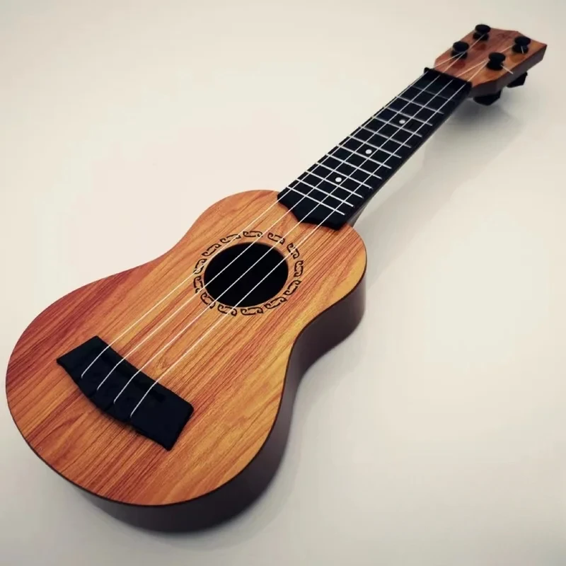 Brinquedo de guitarra infantil pode ser usado para tocar instrumentos elementares com pás simulando brinquedos musicais Yukrili