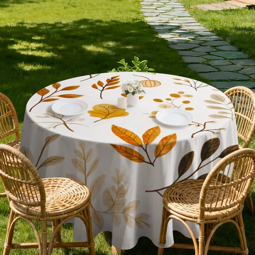 One round tablecloth with a design of autumn leaves and the sun. It is perfect for creating a breakfast area.