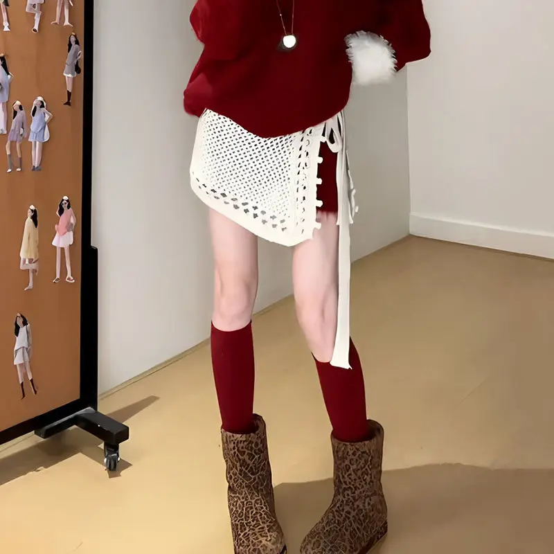 Falda de punto calada de talla grande para mujer, nueva colección otoño-invierno, falda de capa base moderna que cubre la cadera, falda acampanada.