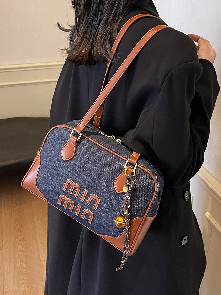 

Canvas bag women's large-capacity brand-name high-end casual one-shoulder underarm bag popular commuter pillow bag this year