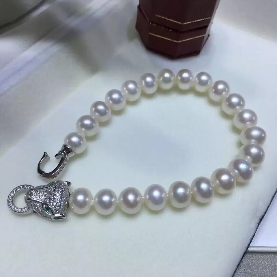 

Stunning Natura AAA Japanes 8-9MM South Sea White Pearl Bracelet 7.5-8 Inch 925S