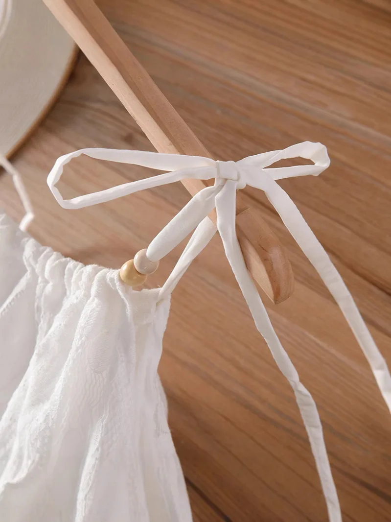 Bohe vestido branco irregular emenda oco gancho flor cinta de espaguete vestido feminino elegante borla verão praia férias vestido