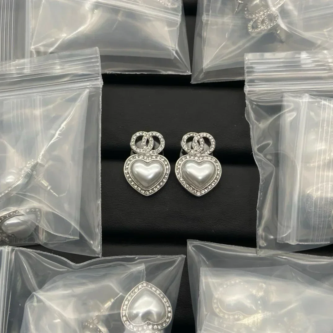 

2025 Fashionable 925 Silver Earrings Female Designed with Classic Style and Trendy Twist Exquisitely Made and Highly Versatile
