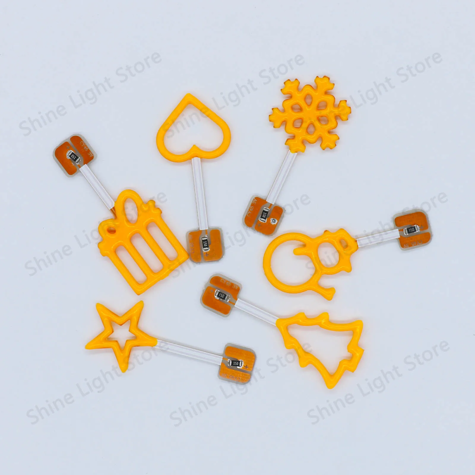 3pcs 3V 크리 에이 티브 필 라멘 하트 크리스마스 트리 눈사람 스타 눈송이 모양 LED 전구 장식 휴일 웨딩 레스토랑