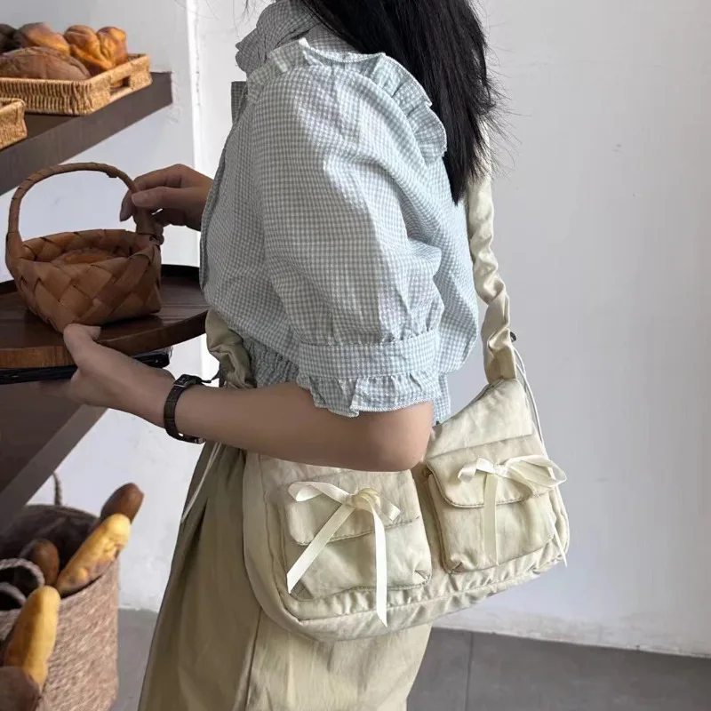 

Japan Style Popular Bow Crossbody Bag Niche Designer Sweet Cloud Ruched Strap Shoulder Bag Versatile Hobo Underarm Bag