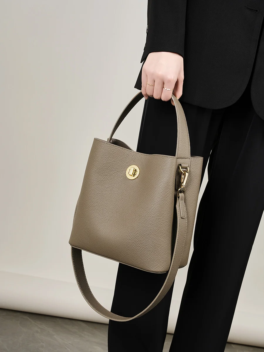 

New leather simple and versatile large capacity multi-function bucket shoulder bag