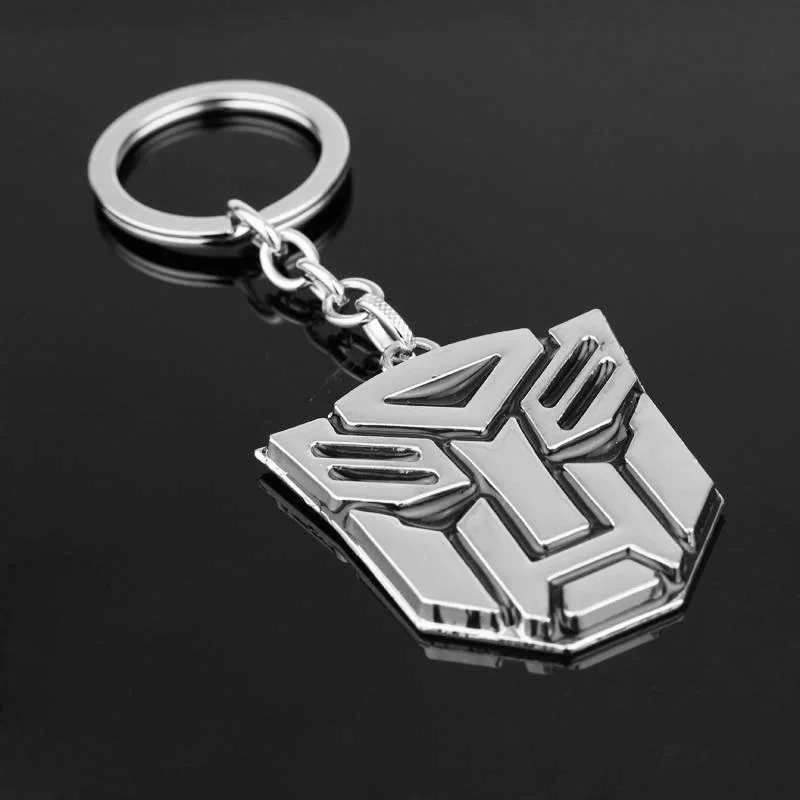 Cartoon Transformers Peripheral Optimus Prime Logo Mad Autobots Brelok do kluczy Breloki Wisiorek Prezent urodzinowy Cosplay Rekwizyty Biżuteria