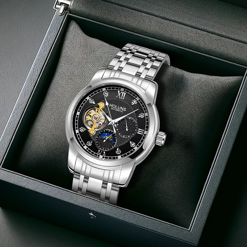 

Мужские механические часы в деловом повседневном стиле с серебряным корпусом, черным циферблатом, стальным ремешком и маркерами часов со стразами.