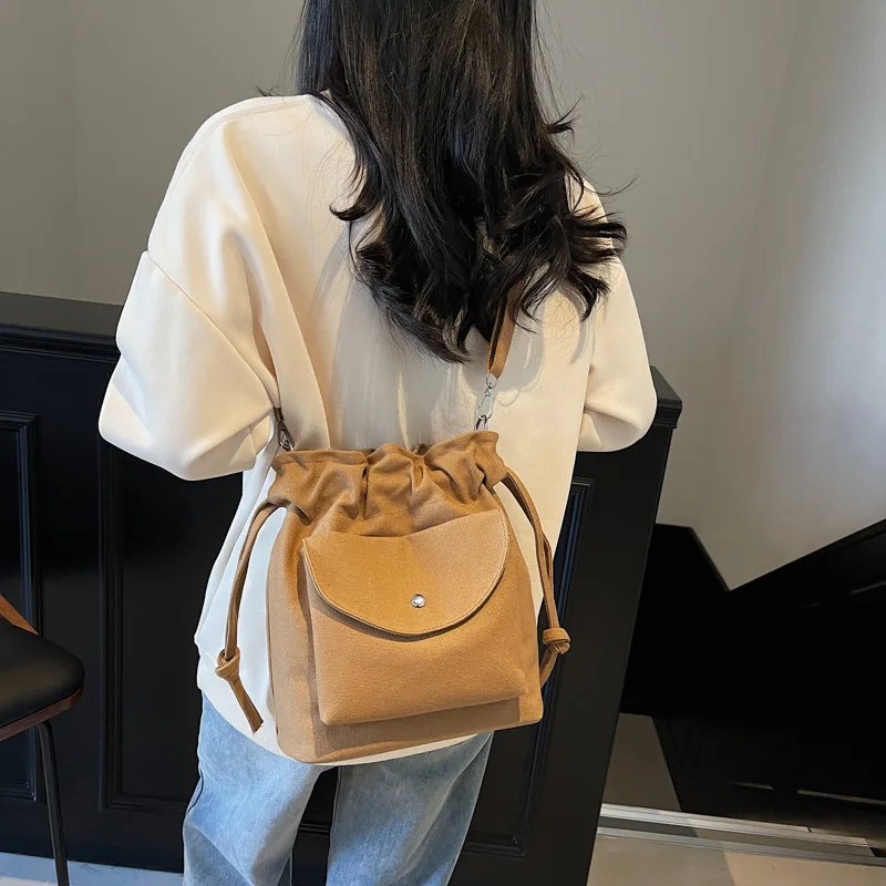 

New Canvas Fashionable Solid Color Temperament Bucket Bag, Women's Bag, Simple and Versatile Commuter Oblique Span Bag
