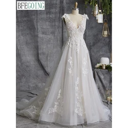 Ivory Lace Appliques Beading A-Line Wedding Dresses Chapel Train Custom Made Floor-Length V-Neck Sleeveless Bridal Gowns