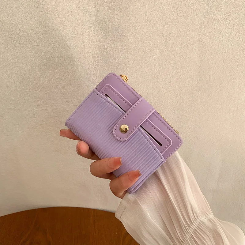 محفظة نسائية قصيرة جديدة لربيع وصيف النسخة الكورية مشبك مطبوع بسيط كل شيء قابل للطي محفظة نسائية قصيرة من جلد البولي يوريثان