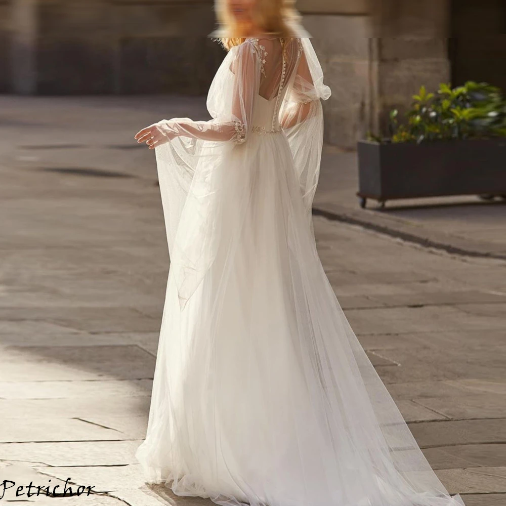 ชุดแต่งงานสีขาวผ้าทูลล์สั่งทำพิเศษ สายคาดเอวสวยหรู คอวีเซ็กซี่ คุณภาพสูง สำหรับงานแต่งงานหรูหรา ปี 2025 ชุดเจ้าสาวประณีต