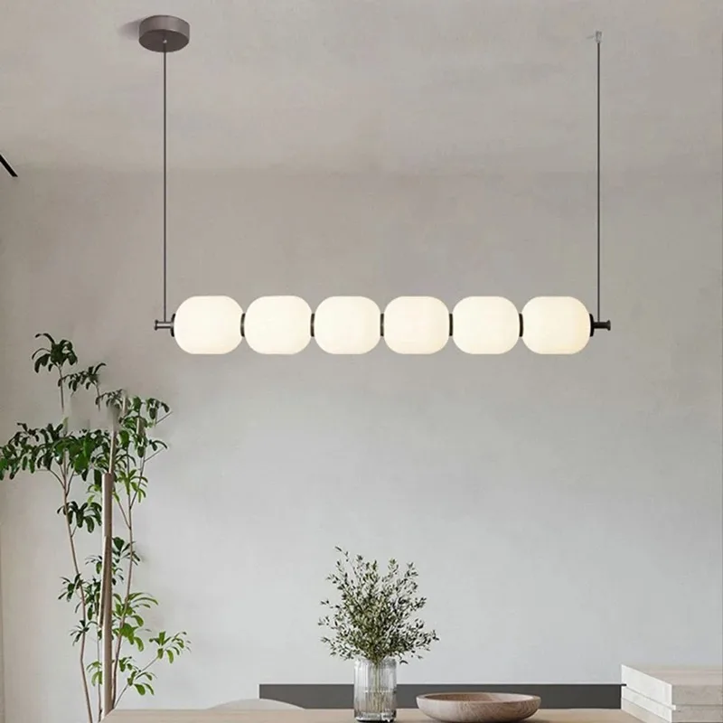 

Modern Nordic Glass Bulb Long Glass Pendant Lamps Bedroom Living Room Restaurant Bar Minimalist Necklace LED Hanging Chandeliers