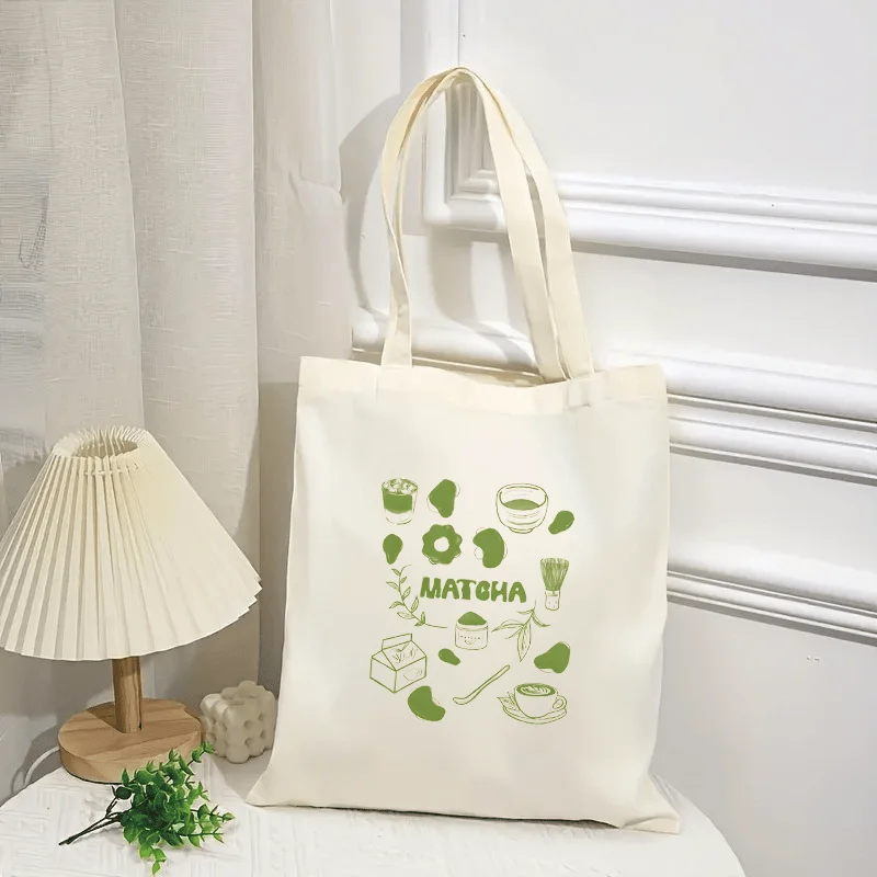 A tea-colored element Pattern printed canvas tote bag, suitable for daily use, shopping, school, and travel