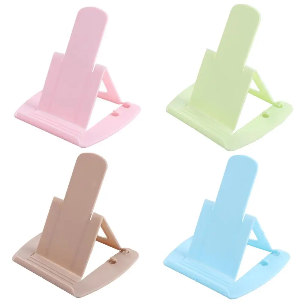 

Plastic Foldable Desktop Phone Holder Folding Adjustable Mobile Tablet Stand Mini Portable Cell Phone Bracket