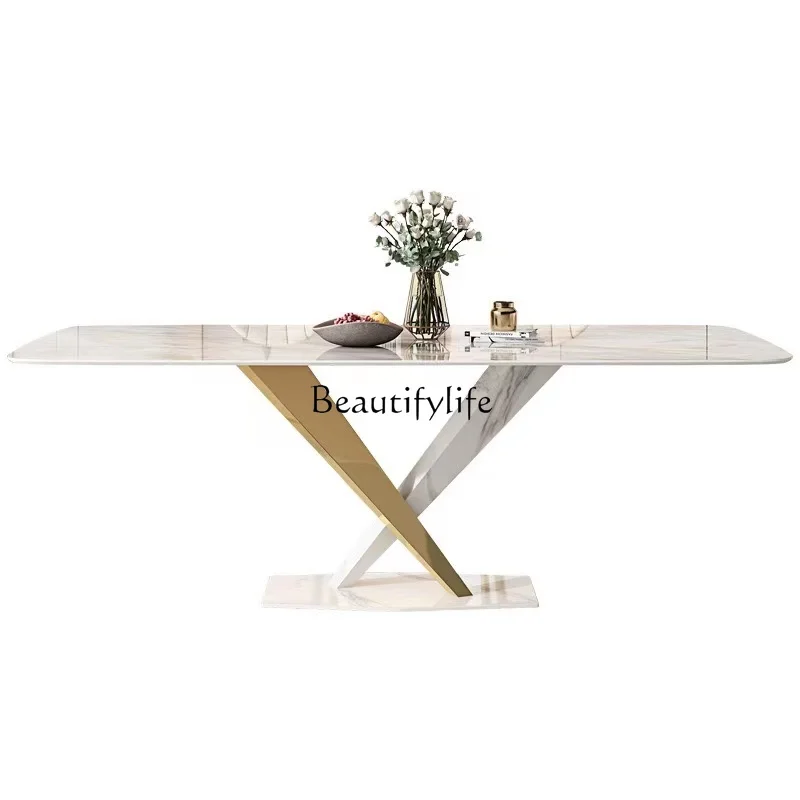 

Rock slab dining table light luxury high-end household small apartment cream style dining table