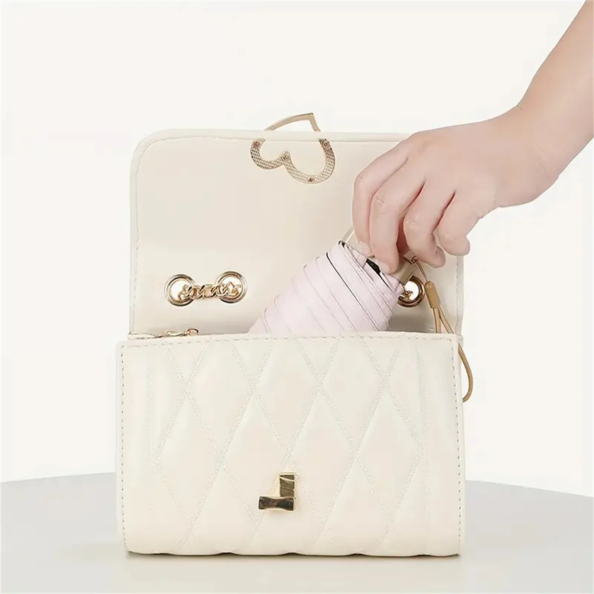 مظلة شمسية صغيرة محمولة صغيرة مقاومة للماء والرياح وحماية من الأشعة فوق البنفسجية للمطر والسفر اليومي للنساء مظلة جيب كبسولة