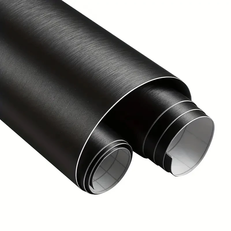 Schwarze Vinyl-Wickelrolle aus gebürstetem Stahl und Metall mit selbstklebender Aufkleber für die Luftentlastung von Autoverpackungsfolien