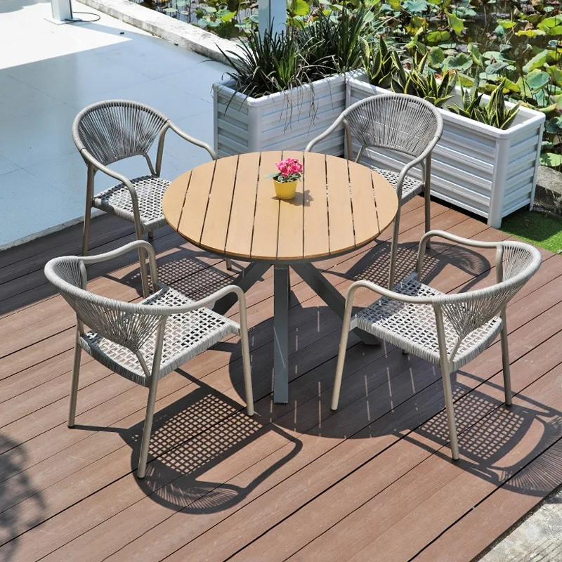 Table and chair courtyard balcony garden dining table waterproof Nordic plastic wood solid carbon steel round table