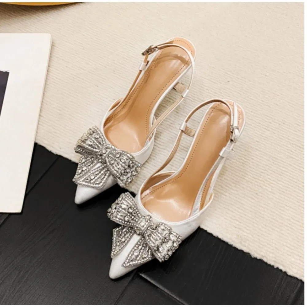 

Весенне-летние модные женские туфли-лодочки со стразами и бантом, пикантные шелковые туфли с острым носком, необычные туфли на высоком каблуке для выпускного вечера, цвета: золото, серебро