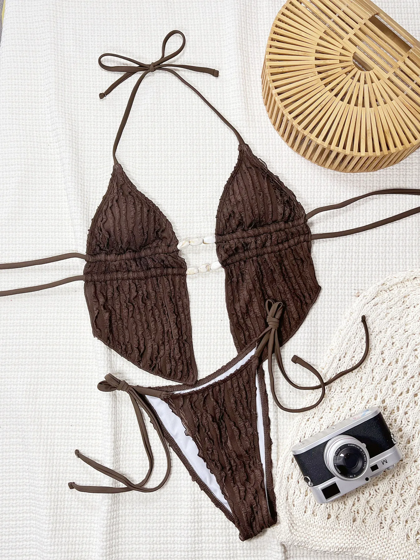 طقم بيكيني ملابس سباحة نسائية لقضاء عطلة الربيع الساخن على الشاطئ مع وسادة صدر ملابس سباحة مثيرة بدون ظهر 2026 منتج جديد