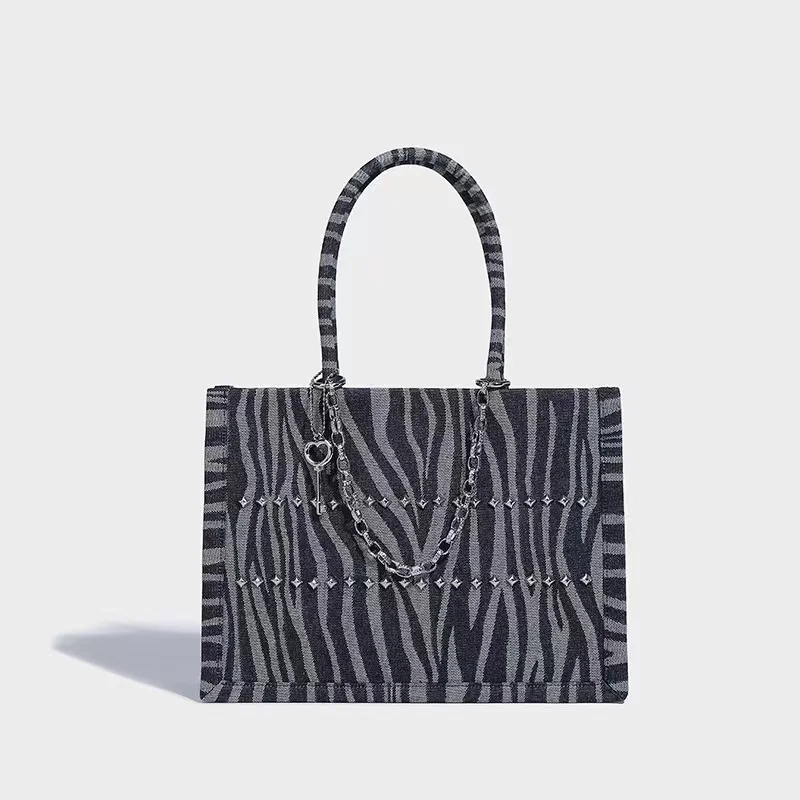 

Niche design zebra print denim tote bag highend fashion and simple chain shoulder bag large capacity commuting versatile handbag