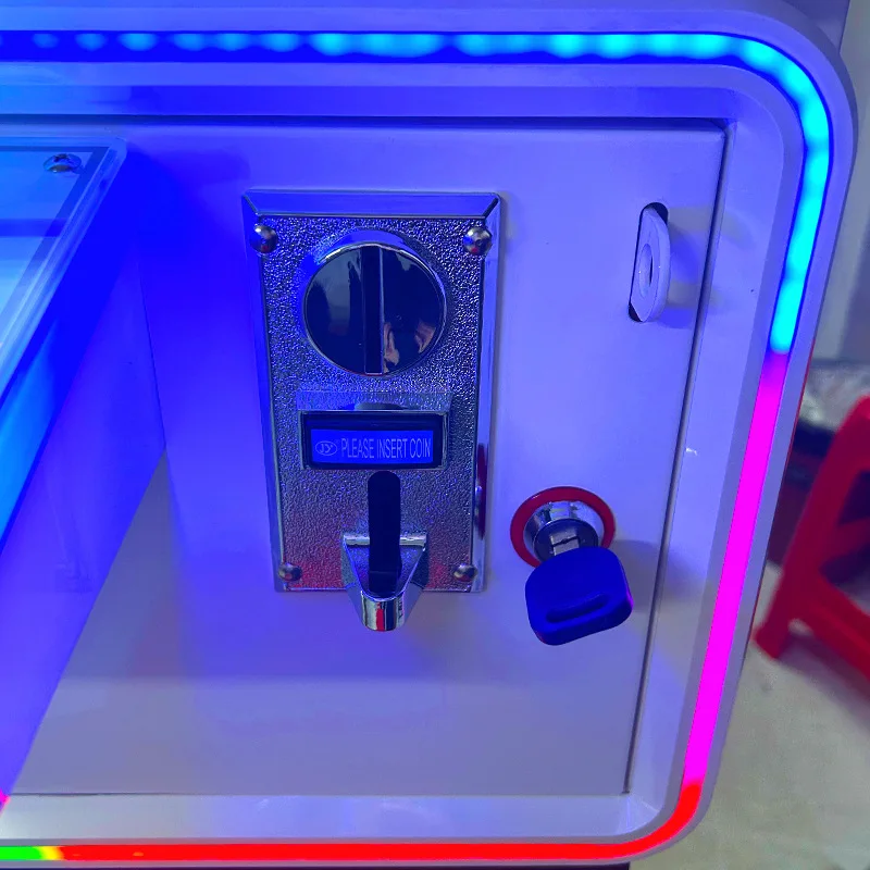 Small coin-operated doll grabbing machine Mini scan code clip doll gift machine Rubik's cube boutique machine