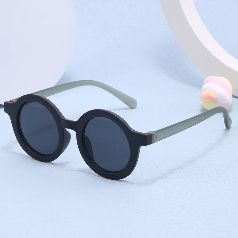 Fashionable new children's sunglasses with UV protection and sun protection, cute and trendy baby concave shaped glasses