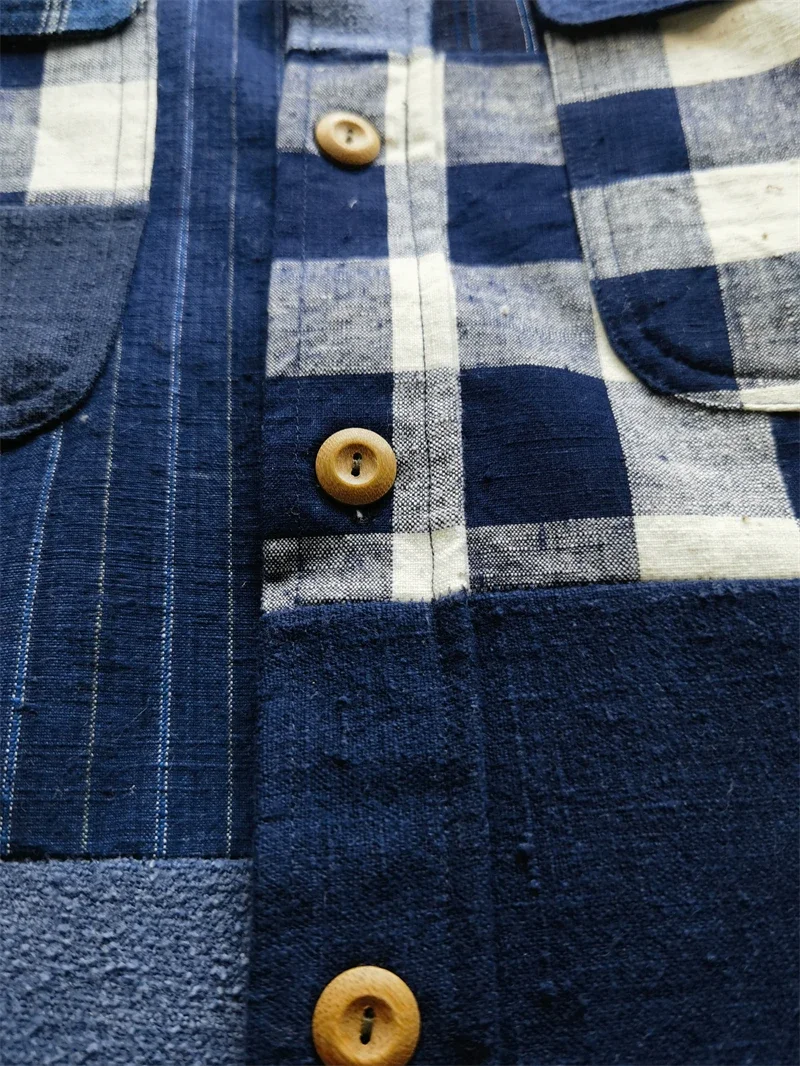

Blue-dyed handmade shirt with vintage and elegant fabric patchwork design
