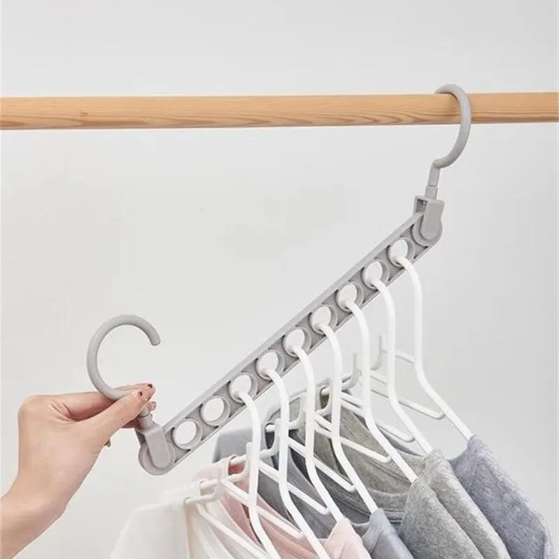 1 pz Nine Hole Magic Hanger creativo Multi Functional Hanger Household Internet popolare Magic Storage artefatto