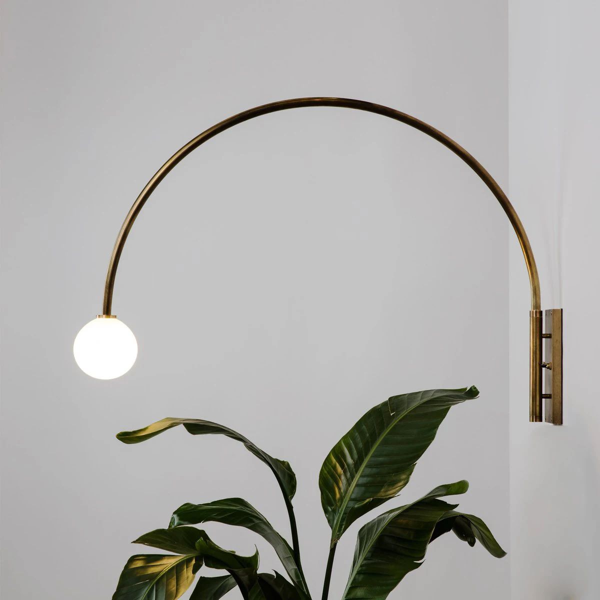

Minimalist Golden Arch Wall Lamp - Rotatable Metal Art, G9 LED for Dining Room & Living Room Decor