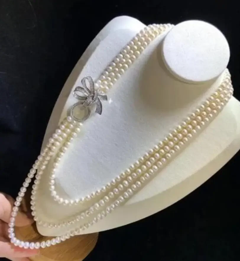 

Hand knotted 3strands 7-8mm white freshwater pearl necklace bowknot micro inlay zircon accessories pearl pendant long 55-65 cm