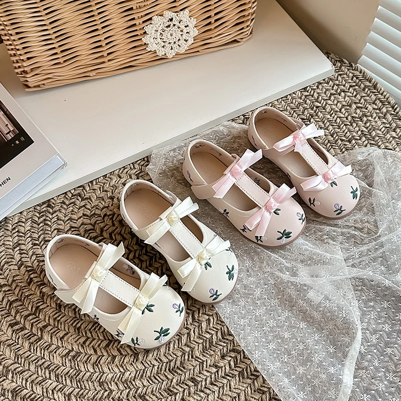 

Детские туфли для девочек с Т-образным ремешком в стиле принцессы, кожаные, с круглым носком, новая модная коллекция 2026 года, на плоской подошве, с милыми бантиками