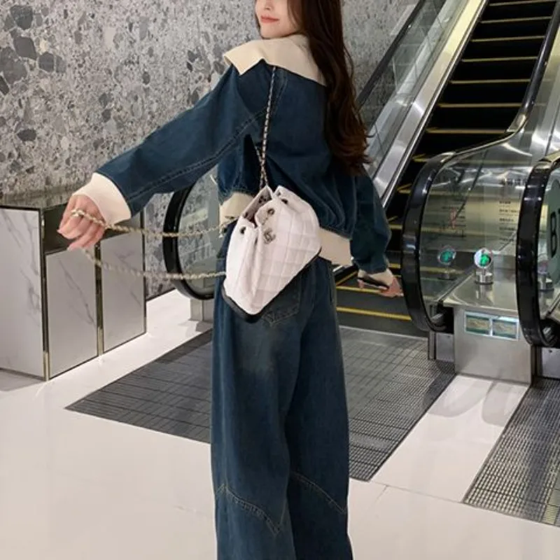 Abito di fascia alta autunno inverno Nuova giacca di jeans coreana che riduce l'età e pantaloni a gamba larga alla moda e straniera Set alla moda in due pezzi