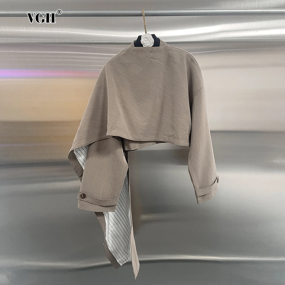 

VGH Irregular Solid Casual Short Jackets For Women Stand Collar Long Sleeve Spliced Button Minimalist Loose Coats Female Fashion