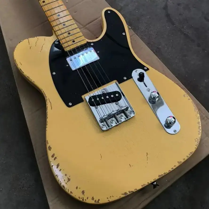 Milk yellow six-string old electric guitar, basswood body, maple neck, black panel support personalized customization.