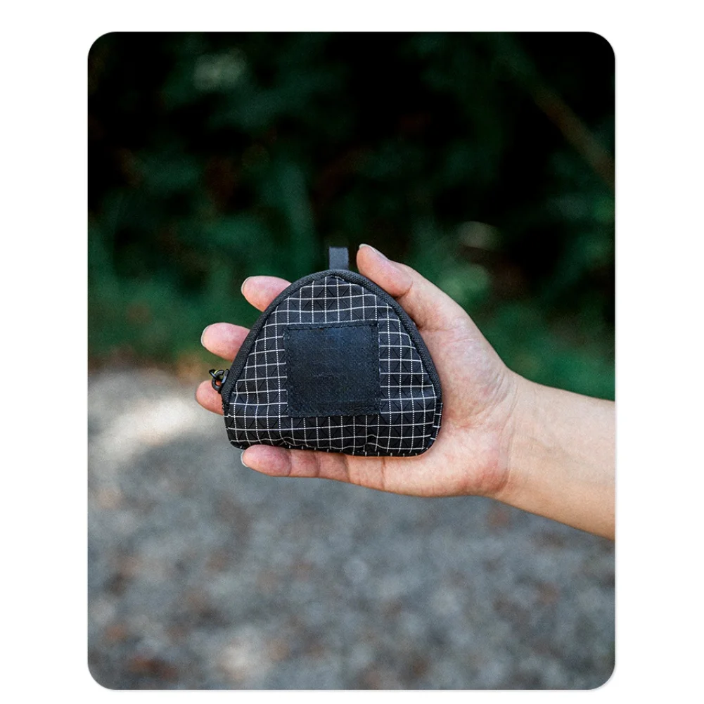 

Travel clothes drying rope with clip attachments adjustable length nylon line and integrated storage pouch for outdoor use