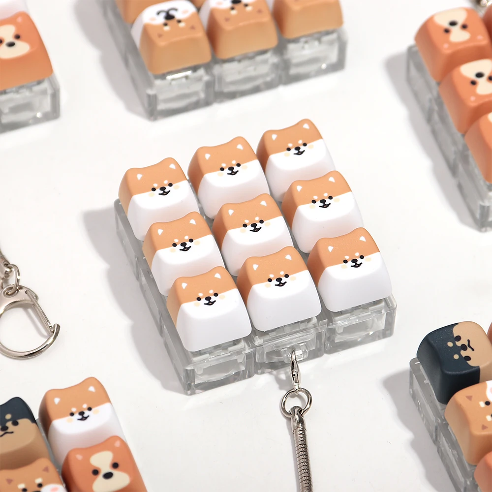 Neue 9-Tasten-Hunde-Finger-Tastatur ohne Beleuchtung, Stressabbau-Fidget-Schlüsselanhänger, Zeitvertreib-Tastenknopf, Quetschspielzeug für Erwachsene – Detail 3