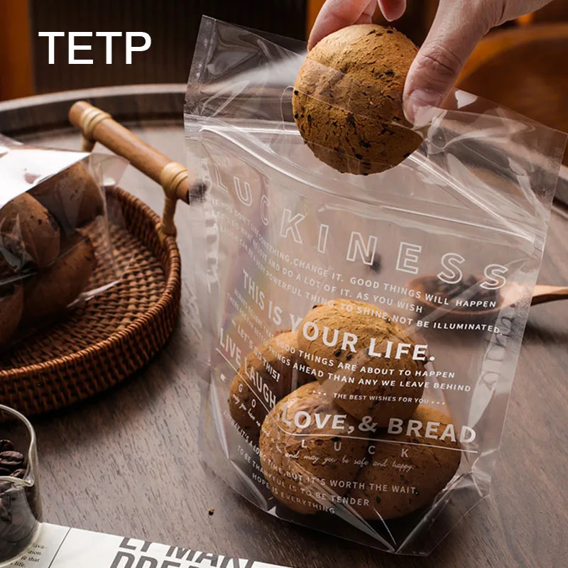 

TETP 50Pcs Bread Packaging Bags with Handle Transparent Self-Standing Sealed for Hanmade Croissant Mochi Donut Bakery Storage