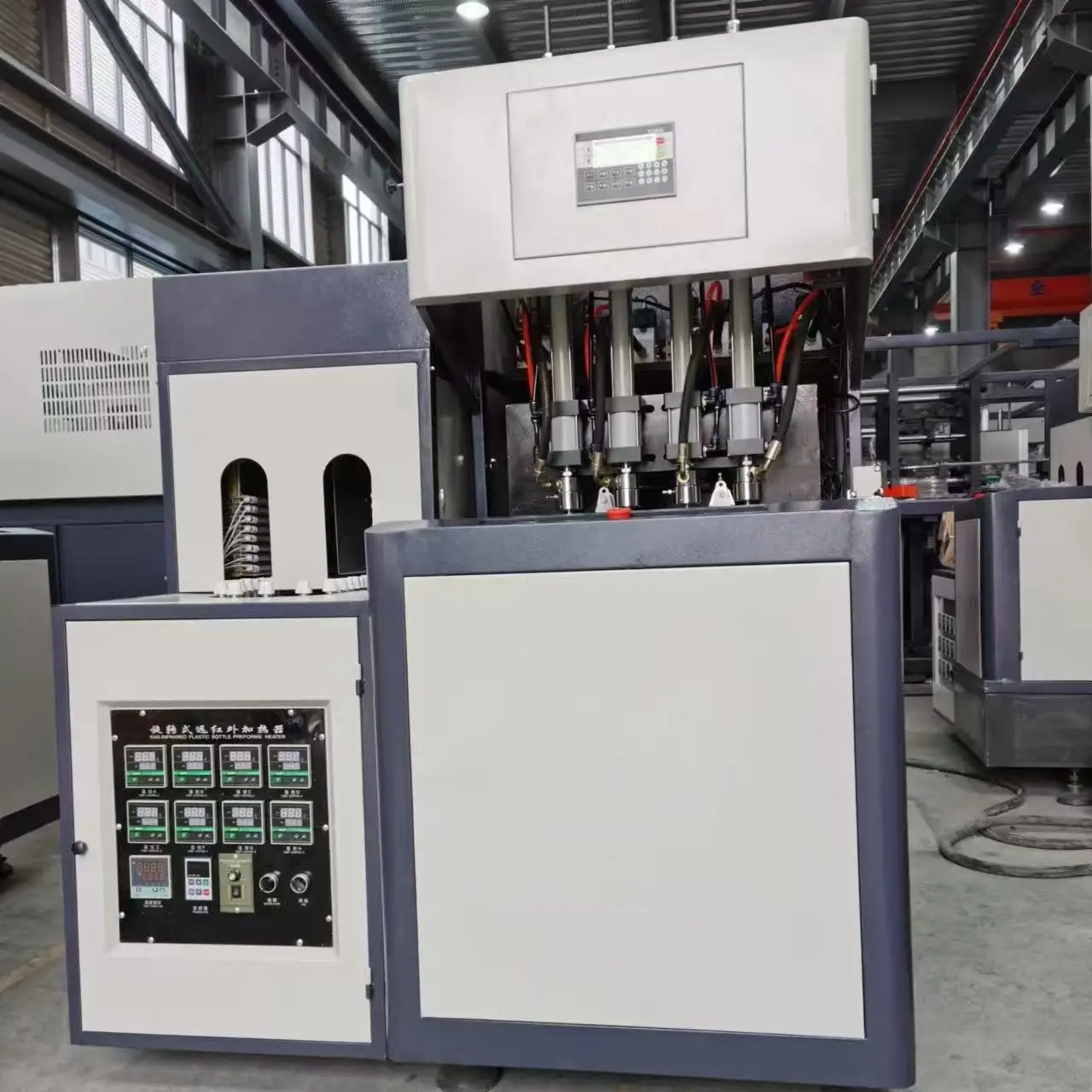 Semi-Auto 4 Cavity Stretch Blow Molding Machine Auto Preform Feeder for PET Mineral Water Beverage Plastic Bottle Production