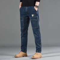 2025 nuevo estilo Jeans hombres Slim Fit estilo coreano cómodo pierna recta elástico gris Mediados de cintura pantalones casuales de mezclilla para hombres