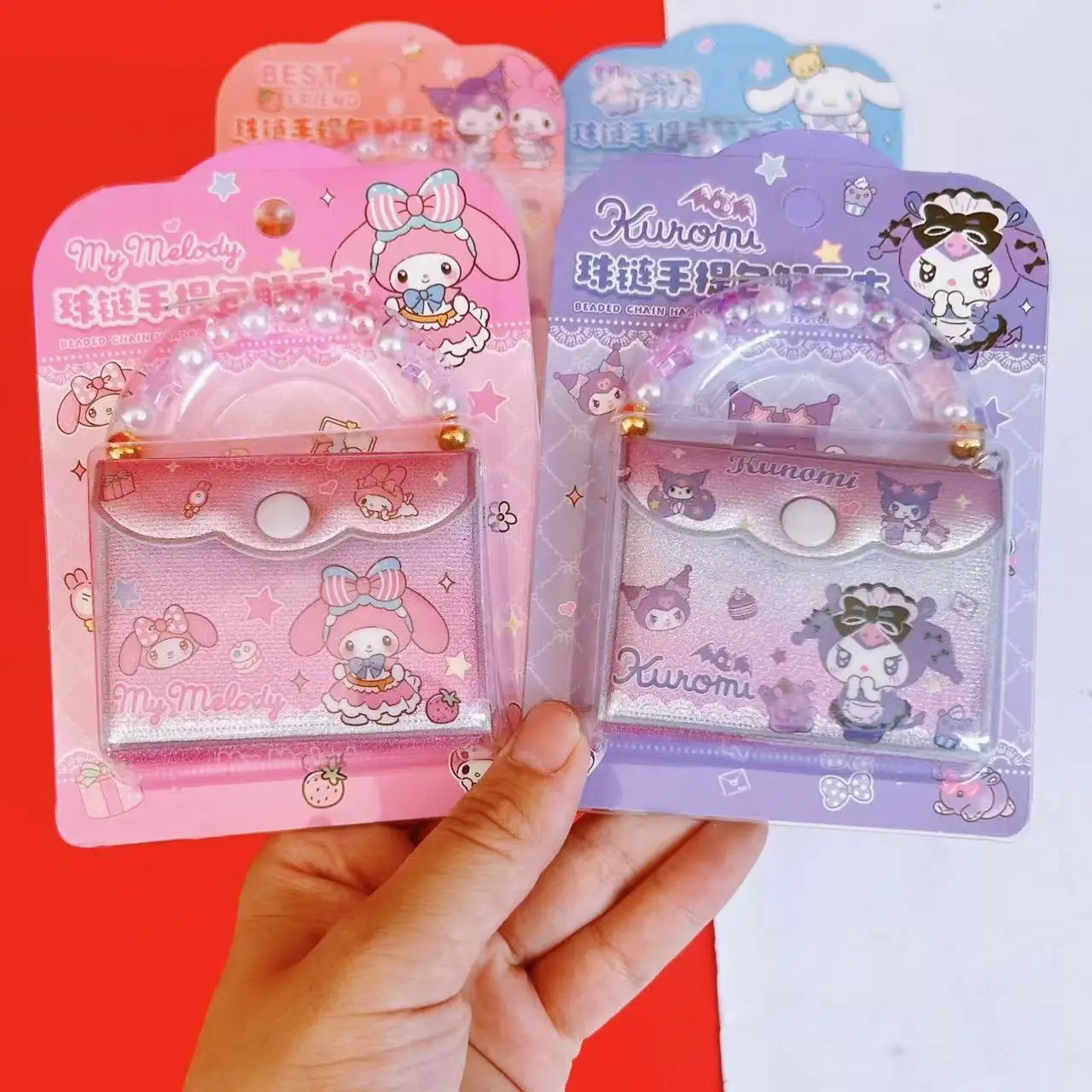 

Cute new Hello Kitty Kuromi adorable pet charm chain handbag memo book children's portable notebook stress-relieving snap-on c