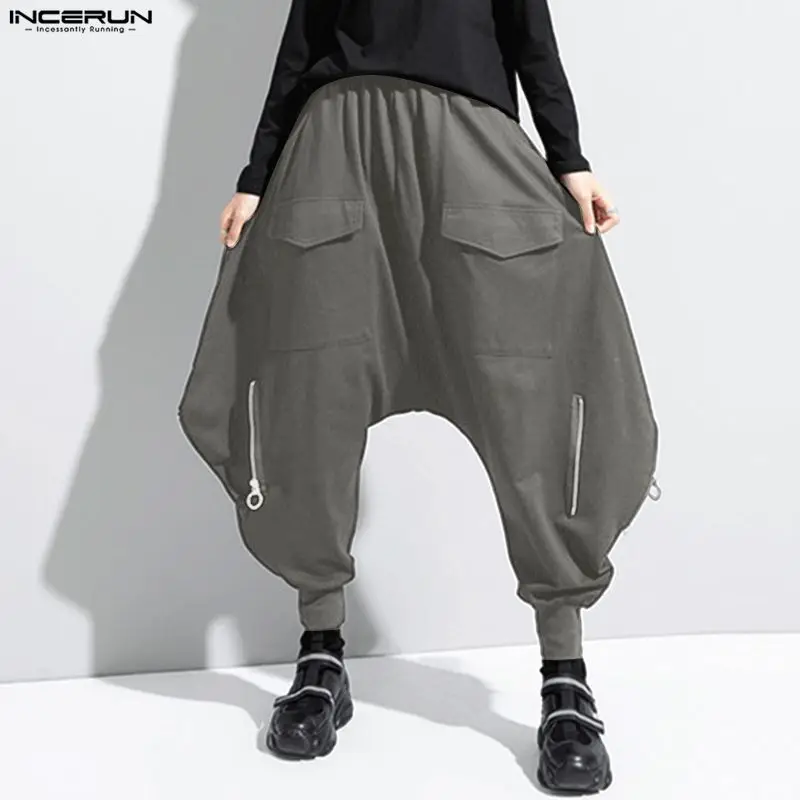 

INCERUN Men Pants Solid Color Elastic Waist Joggers Loose Zipper Drop-crotch Pants Streetwear 2026 Pockets Casual Trousers Men