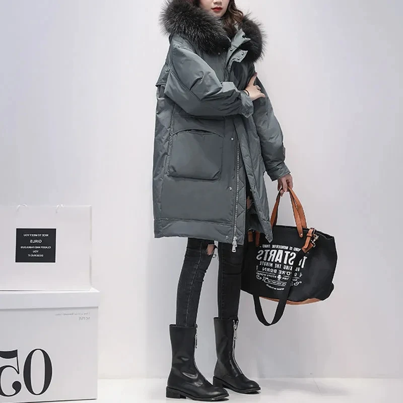 سترة نسائية متوسطة الطول 2026 شتاء النسخة الكورية الجديدة أنثى ريال الراكون الفراء طوق موضة 90% معاطف بيضاء أسفل البط #1