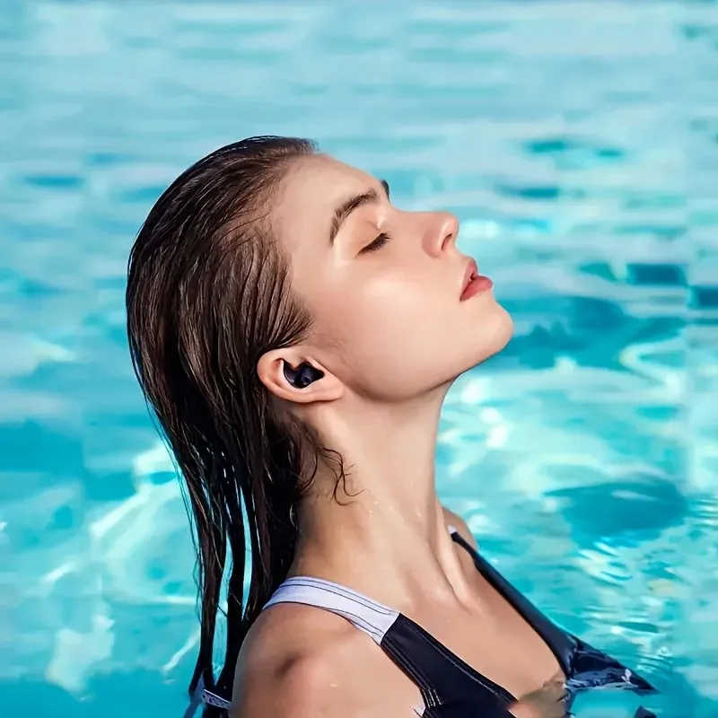 latest models a pair of reusable swimming earplugs for swimming, surfing, and snorkeling. available in a variety of colors.