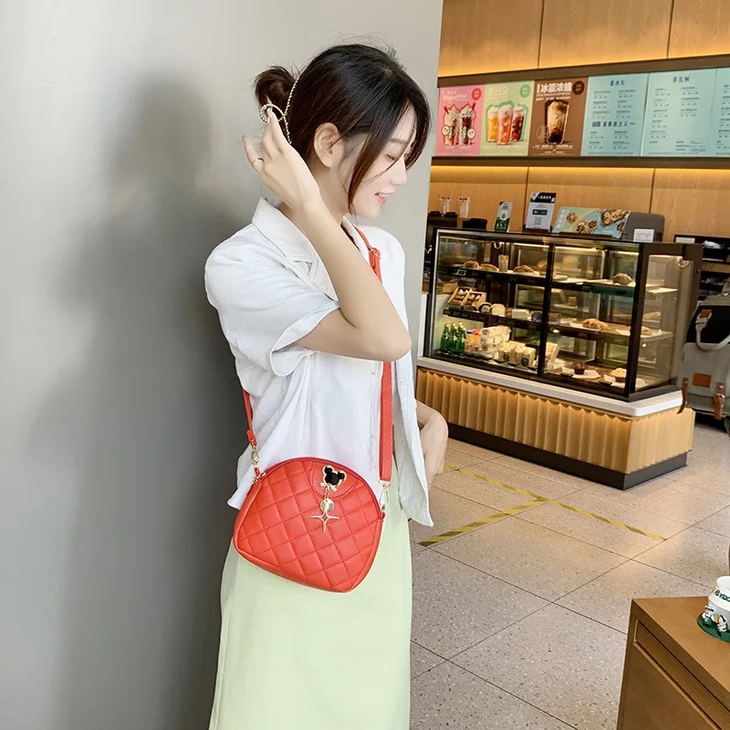 MINISO Ladies  Small Round Bag New 2023 Messenger Bag Round Cake Bag Fashion Mickey Pendant Simple One Shoulder Messenger Bag